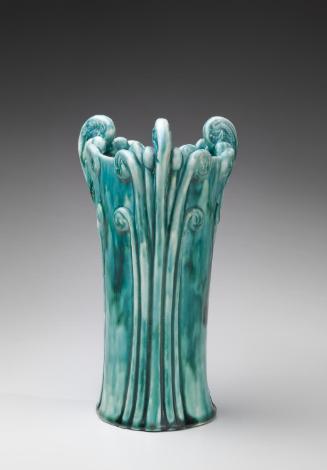 Vase with fiddlehead fern design