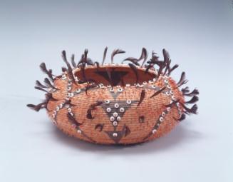 Feathered three-rod coiled basket