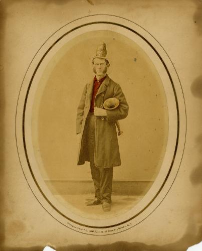 Member of Newark Fire Department (probably John B. Thorn) in uniform, 1869-1873