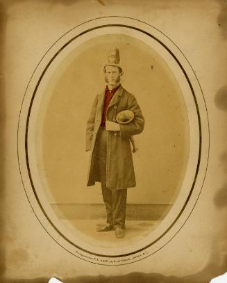 Member of Newark Fire Department (probably John B. Thorn) in uniform, 1869-1873