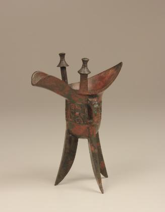 Archaistic Jue  Wine Cup with Buffalo and Taotie Motifs