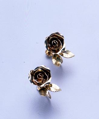 Earrings of rose blossoms and leaves