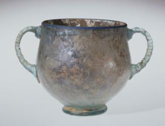 Cup with twisted handles